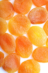 Wall Mural - Dried apricots on white background