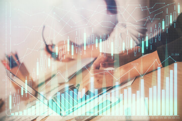 Multi exposure of woman hands typing on computer and financial chart hologram drawing. Stock market analysis concept.