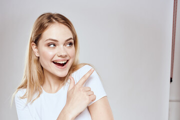 Canvas Print - emotional blonde white t-shirt close-up studio lifestyle fun