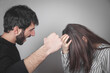 © andranik123 - Aggressive man threatens to hit a young girl.