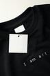 © Atlas - Stylish blank black sweatshirt on white table