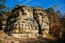 Monument Sandstone Rock Sculptures Certovy Hlavy - Devils Heads Created By Vaclav Levy Between Libechov And Zelizy, Cliff Carvings Carved In Pine Forest, Czech Republic