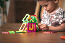 Baby Playing The Magnetic Tiles