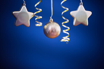 Christmas golden star ornaments in holiday night