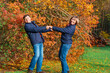 © soleg - couple walking in autumn city park, happy people together, beautiful nature with colorful leaves