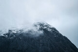 Fototapeta Na ścianę - Snowy mountain on a misty day