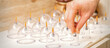 © okskukuruza - Masseur takes vacuum massage glass jars of traditional Chinese cupping therapy from table in spa