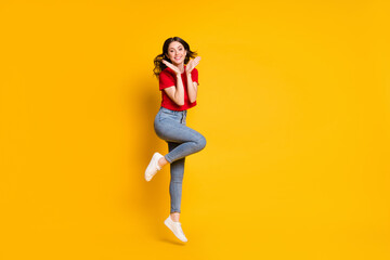 Sticker - Full size photo of cheerful attractive girl jump wear sneakers isolated over vivid color background