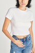 Women in a sexy white cropped top with design space