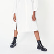 © Rawpixel.com - Black woman wearing ankle boots with a white shirt dress mockup
