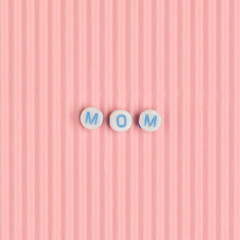 Poster - MOM beads text typography on pink