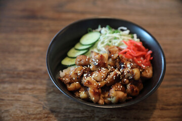 Wall Mural - japanese food Chicken teriyaki with rice on wood background