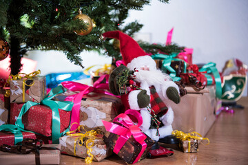 Wall Mural - Gifts on the floor under the Christmas tree.