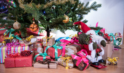 Wall Mural - Gifts on the floor under the Christmas tree.