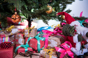 Wall Mural - Gifts on the floor under the Christmas tree.