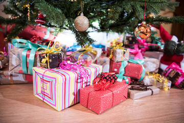 Wall Mural - Gifts on the floor under the Christmas tree.