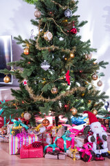 Wall Mural - Gifts on the floor under the Christmas tree.