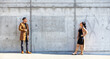 © Mat Hayward - Two African American women stand apart for a social distancing conversation outside during Covid-19 coronavirus pandemic