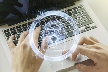 Poster - Creative idea concept with lock symbol and microcircuit illustration and hands typing on laptop on background. Protection and firewall concept. Multiexposure