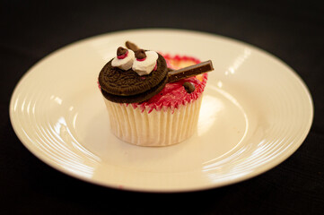 Wall Mural - chocolate cupcake with frosting