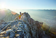© Christian Vorhofer/Westend61 - Austria, Tyrol, Innsbruck, mountaineer at Nordkette via ferrata
