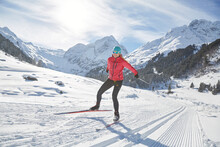 Austria, Tyrol, Luesens, Sellrain, Cross-country Skier In Snow-covered Landscape