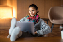 Portrait Of Fashionable Young Woman With Laptop