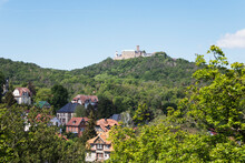 Germany, Thuringia, Eisenach, Wartburg Castle Overlooking Town Below