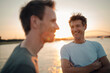 © Gustafsson/Westend61 - Two friends meeting at sunset, spending the evening talking