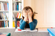 © Larissa Veronesi/Westend61 - Frustrated girl with homework