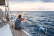 © Konstantin Trubavin/Westend61 - Indonesia, Lombok island, man sitting on deck of a sailing boat