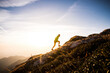 © giorgio pulcini/Westend61 - Italy, man running on mountain trail