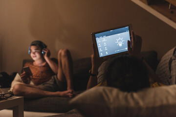 Couple relaxing on couch in smart home