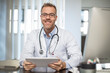 © zerocreatives/Westend61 - Portrait of smiling doctor in medical practice