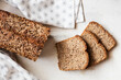 © Eva Gruendemann/Westend61 - Buckwheat bread loaf with sliced bread kept on table