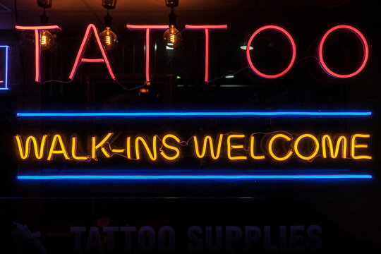 Neon Tattoo Sign in Window