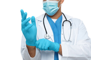 Poster - Doctor in protective mask putting on medical gloves against white background, closeup