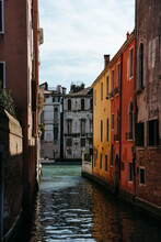Reflections Of Old Houses In The Water In Venice.