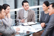 © Blue Jean Images - Business team having a meeting