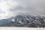 Fototapeta Konie - snow covered mountains