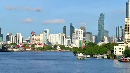 Wall Mural - Time lapse Bangkok City modern office buildings, condominium, hotel with Chao Phraya River in the capital of Thailand	