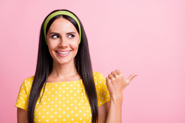 Sticker - Photo of positive attractive person look direct thumb empty space retro dotted outfit isolated on pink color background