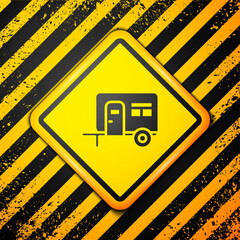 Wall Mural - Black Rv Camping trailer icon isolated on yellow background. Travel mobile home, caravan, home camper for travel. Warning sign. Vector.