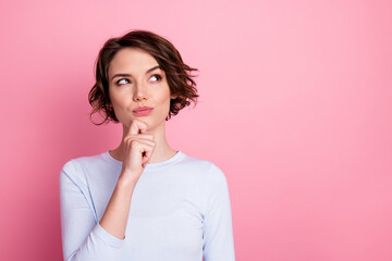 focused smart girl look copyspace touch hand chin think decide wear pullover isolated pastel color b