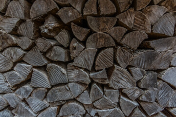 stacked and cut firewood in the mountains