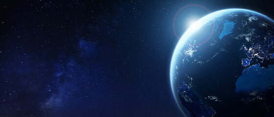 Wall Mural - planet earth from space with city lights in europe and north america. world with sun and star backgr