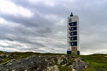 Punta Frouxeira Lighthouse Under A Gray Stormy Overcast Sky
