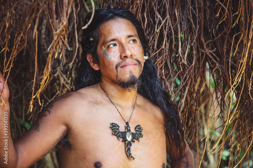 Cuadros en Lienzo Portrait of native american Indian young man wearing mineral stone necklace