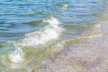 Sticker - ,  - Jan 01, 1970: Closeup shot of Black Sea waves splashing on the shore