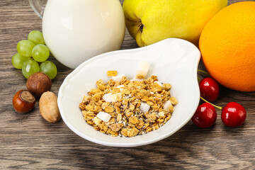 Breakfast with granola and milk